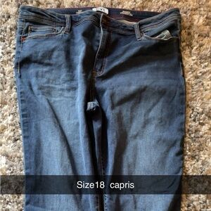 Two pairs of capris, two pairs of jeans, one blue one black